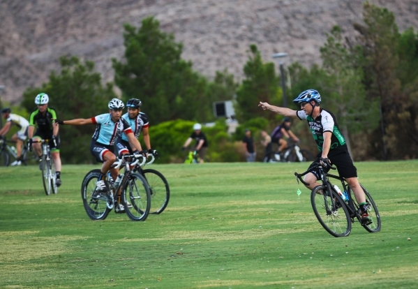 Las Vegas Cyclo-Cross member Brian Larson, right, leads the group on a course while training at Red Ridge Park, near Durango Road and Arby Avenue. (Chase Stevens/Las Vegas Business Press) Follow C ...