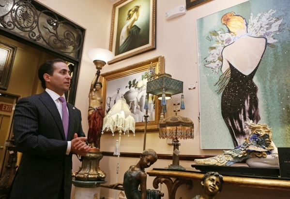 General manager Ike Dweck gives a tour of an upstairs showroom at Regis Galerie located inside the Grand Canal Shoppes at The Venetian on July 24. A Christopher Guy mozaic is shown hanging at far  ...
