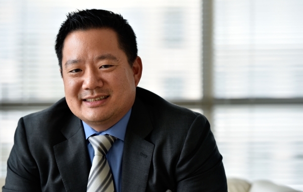 Kai-Shing Tao, CEO of Remark Media, sits in his Las Vegas office on Tuesday, Aug. 25, 2015. Remark Media, a digital media company focusing on the 18- to 34-year-old age group, recently acquired th ...