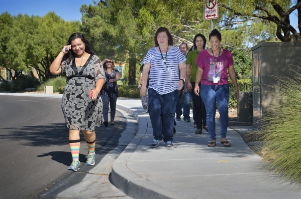 Billing department employees from HealthCare Partners Nevada walk during a break from the office at 650 White Drive on Wednesday, Sept. 9, 2015. Bill Hughes/Las Vegas Review-Journal