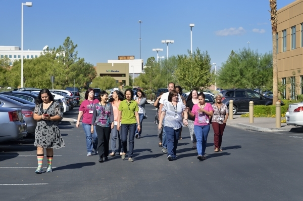 Billing department employees from HealthCare Partners Nevada set out on a walk during a break from the office at 650 White Drive on Wednesday, Sept. 9, 2015. Bill Hughes/Las Vegas Review-Journal