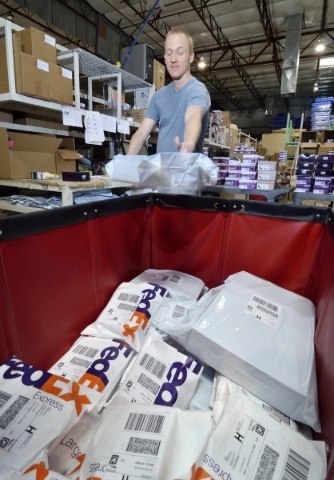 Scott Boehm, internet packing manager at Pediped Footwear, is shown filling orders in the company warehouse at 1191 Center Point Drive in Henderson on Thursday, Oct. 8, 2015. (Bill Hughes/Las Vega ...