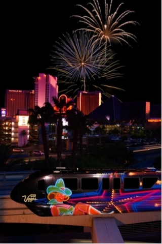 Fireworks explode over the Strip marking the new year as the Monorail moves revelers between parties. (Courtesy Las Vegas Monorail)