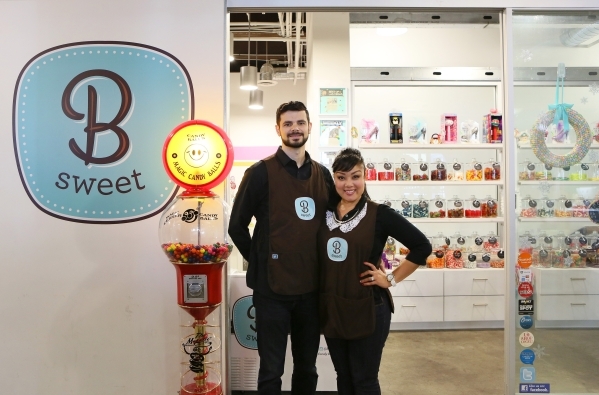 Victor Bordinhao, left, and his wife Arlene, owners of B Sweet Candy Boutique, stand outside B Sweet Candy Boutique Friday, Nov. 6, 2015, in Las Vegas. The local sweets shop and catering business  ...