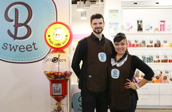 Victor Bordinhao, left, and his wife Arlene, owners of B Sweet Candy Boutique, stand outside B Sweet Candy Boutique Friday, Nov. 6, 2015, in Las Vegas. The local sweets shop and catering business  ...