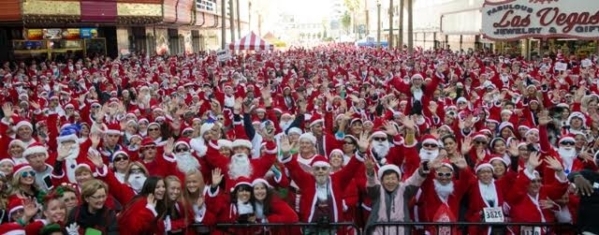 A sea of more than 9,000 Kris Kringle lookalikes joined local Las Vegas celebrities and Opportunity Village Dec. 5 for the 11th annual Las Vegas Great Santa Run to kick off the holiday season. DEC ...