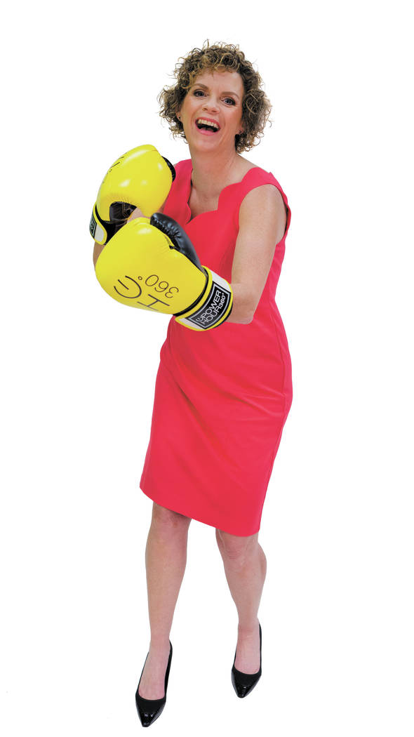 Darcy Neighbors, CEO of CIM Marketing Partners, throws boxing punches in the Las Vegas Review-Journal studio, Las Vegas, Feb. 22, 2017. Neighbors enjoys spending her free time in the gym doing mul ...