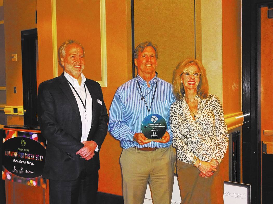Craig Ruark/Las Vegas Business Press
Jan Jones Blackhurst and Tom Perrigo present the Lifetime Achievement in Sustainability Award to Gary Wood, Green Chips co-founder and Renewable Energy Program ...