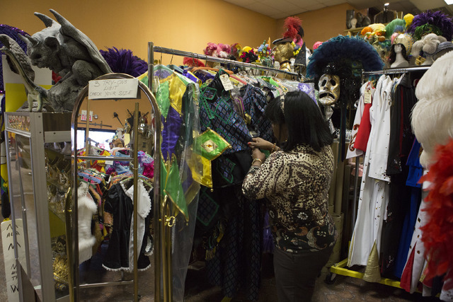 Manager Glenda Scott looks through items at Williams Costume on Thursday, Feb. 16, 2017, in Las Vegas. Scott has worked at Williams Costume for 20 years. (Bridget Bennett/Las Vegas Business Press)