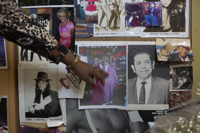 Manager Glenda Scott points to a photo of Nancy Baker, the owner of the store that has passed away, at Williams Costume on Thursday, Feb. 16, 2017, in Las Vegas. (Bridget Bennett/Las Vegas Busines ...