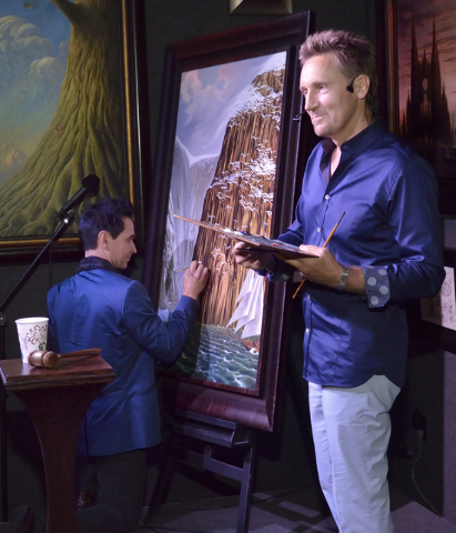 "Jersey Boys" star Travis Cloer, left, and artist Vladimir Kush are shown during a promotional event and charity auction at Kush Fine Art in the Forum Shops at the Caesars Palace hotel-c ...