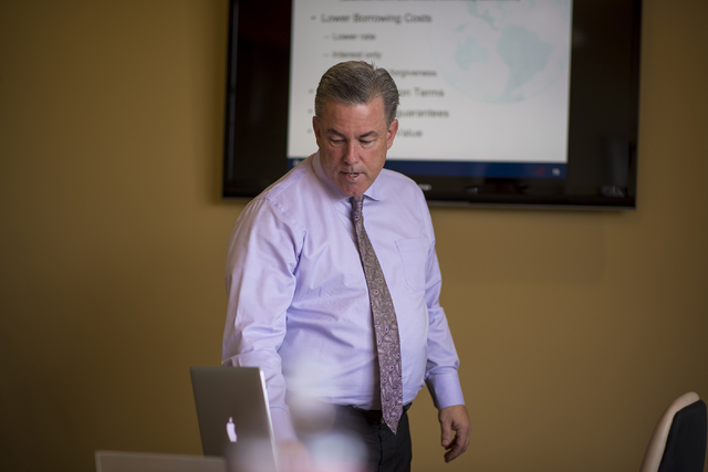 Mike Ballard of Ballard Consulting reviews a presentation in a conference room at his office in Henderson on Thursday, May 14, 2015. (Joshua Dahl/Las Vegas Review-Journal)