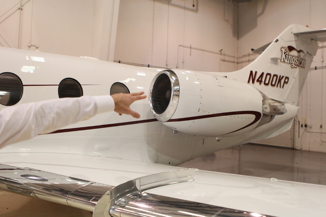 Greg Woods, CEO for Cirrus Aviation Services, talks about the Hawker 400, a small twin-engine jet, part of their jet fleet during an interview at the Atlantic Aviation terminal at McCarran Interna ...