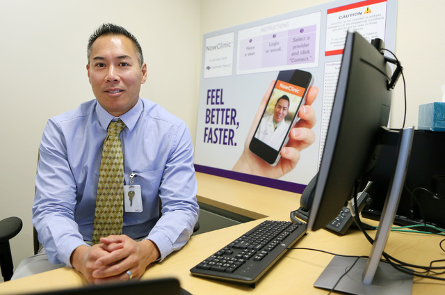 Dr. Eugene Somphone, medical director of Southwest Medical on-demand care, sits in a consult room at Southwest Medical’s NowClinic, which allows patients to connect with doctors for a secure, vi ...