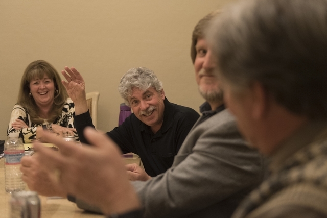 Dave Miller, bassist for the band Alter'd Ego, second from left, speaks with a reporter at the vocalist's residence in Las Vegas Friday, Feb. 19, 2016.  Vocalist Phronsie Markin, left, drummer Lar ...