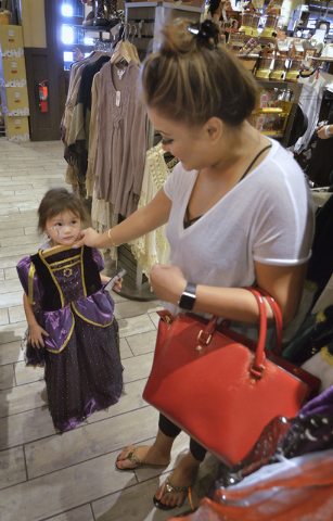 Joanna Lambert, right, checks out a Halloween costume for her daughter Kenley Jade in the store at Cracker Barrel at 8350 Dean Martin Drive in Las Vegas on Friday, Aug. 5, 2016. Bill Hughes/Las Ve ...