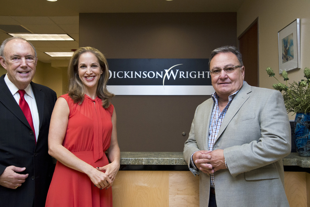 Attorneys Jeff Silver and Kate Lowenhar, left, pose for a photo with Vic Salerno at the Dickinson Wright law offices in Las Vegas on Friday, June 24, 2016. Daniel Clark/Las Vegas Review-Journal Fo ...