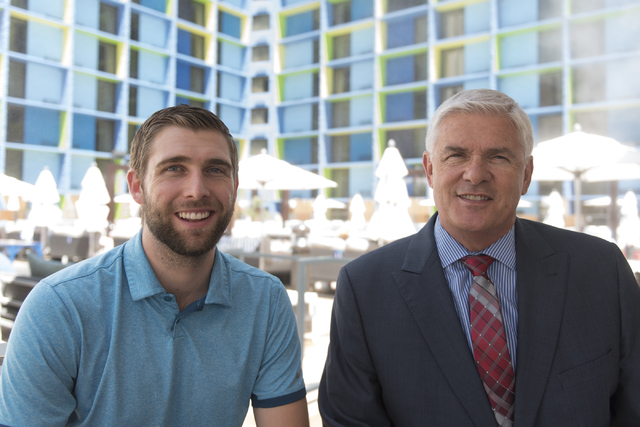 Mark Kelly, vice president of casino operations with Bally's, Paris and Planet Hollywood, right, and his son, Ryan Kelly, pool operations manager at The Linq Hotel, pose at the bar by the pool at  ...