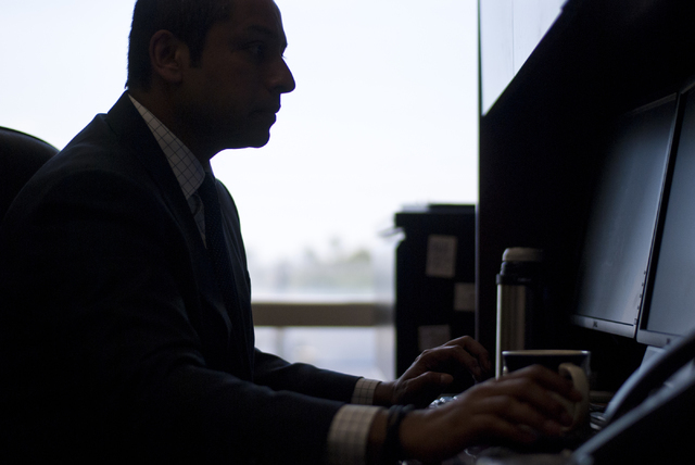 Sharath Chandra, the new administrator of the Real Estate Division of the Department of Business and Industry, uses his computer inside his office in Las Vegas on Thursday, Aug. 25, 2016. Daniel C ...