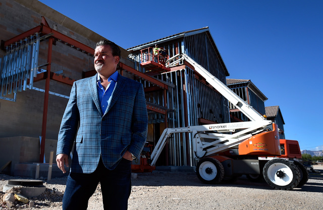 Developer David DelZotto, founder and president of Remington Nevada, looks on at his project, Mountain Edge Marketplace, Monday, Oct. 17, 2016, in Las Vegas. The 185,000 square-foot center at the  ...