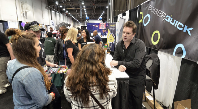 Jared Anderson, president of Liquid Innovations, right, is shown at the SoberQuick booth at the Nightclub and Bar convention and trade show in the Las Vegas Convention Center at 3150 Paradise Road ...