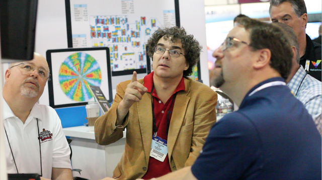 Andrew Cardno (center) and Ralph Thomas (right) wrote the book on casino data analytics -- “The Math that Gaming Made” (2011). Courtesy