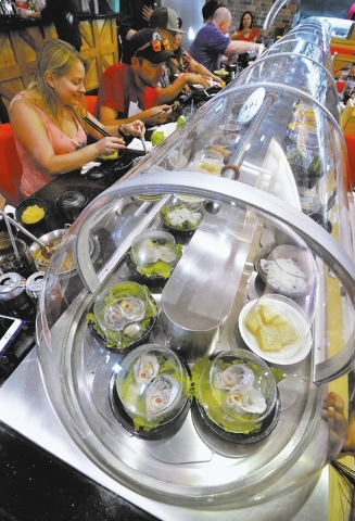 A refrigerated conveyor belt used to take food directly to customers is shown at the Chubby Cattle restaurant at 3400 S. Jones Blvd. in Las Vegas on Thursday, Sept. 1, 2016. Bill Hughes/Las Vegas  ...