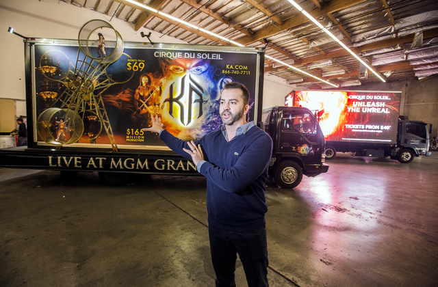 Managing partners Shaun Habibian, left, and Jeremie Watkins stand in front of a custom 3D build-out mobile billboard for “KÀ” by Cirque du Soleil in a warehouse at Kre8 Media Outdoor Advertis ...