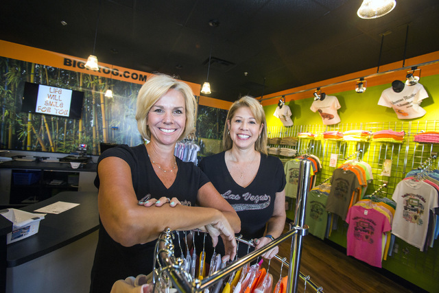 Robyn Brewington, left, and Lisa Hughes opened Big Frog's 72nd location last month. The women purchased the franchise rights from the Florida-based company that specializes in full color, printed  ...