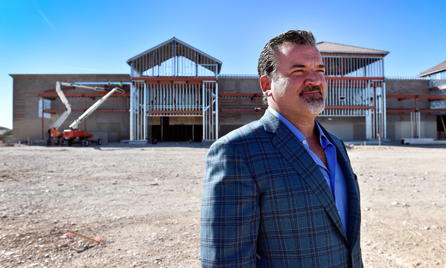 Developer David DelZotto, founder and president of Remington Nevada, looks on at his project, Mountain Edge Marketplace. (David Becker/Las Vegas Business Press)