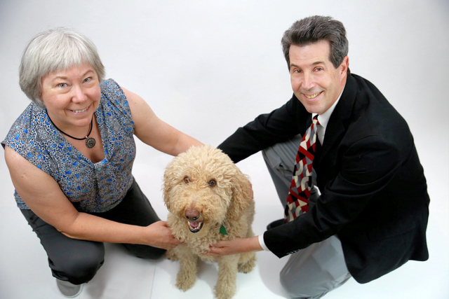 Jeff Saffer and Vicki Burnett, founders of Quertle Industry, a Henderson biomedical big data analytics company, with their dog, Nutmeg. (Courtesy)