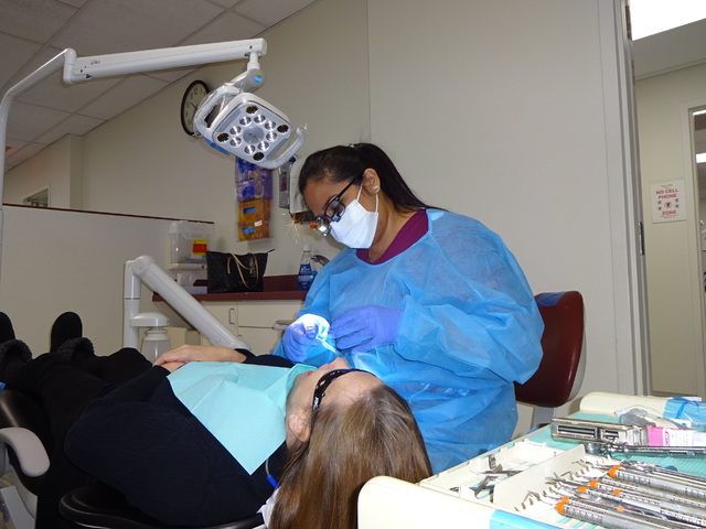 Craig Ruark/Las Vegas Business Press
Kristen San Diego, a third-year student at the School of Dental Medicine, works on a patient at the school's clinic.
