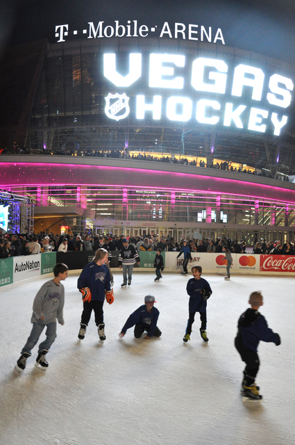 Children skate in front of T-Mobile Arena prior to the unveiling of the city's new NHL franchise name - the Vegas Golden Knights - Nov. 22. Photo by Buford Davis | Business Press