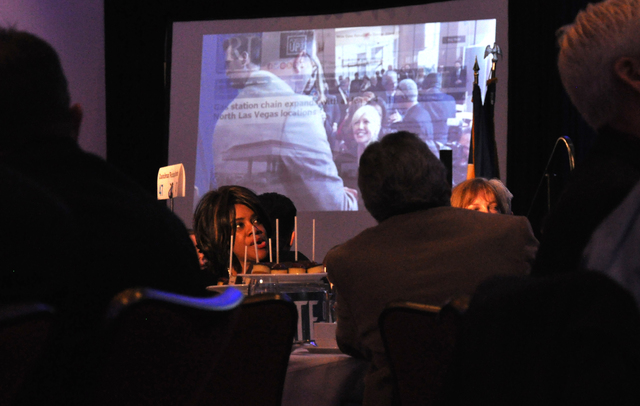 Guests watch video presentations highlighting the economic progress of North Las Vegas during the State of the City address, Jan. 26 at the Aliante Hotel and Casino.   Photo by Buford Davis / Las  ...