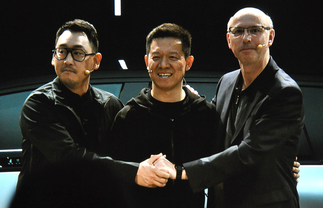 Faraday Future lead designer Richard Kim (left), principal financier Jai Yueting and Nick Sampson, senior vice president of product development and research, share the stage at the unveiling of th ...