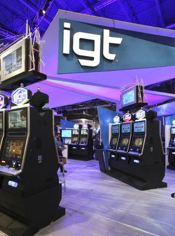 The new IGT logo is seen at the IGT booth at the G2E convention in the Sands Expo in Las Vegas, Monday, Sept. 23, 2013. G2E opens on Tuesday, Sept. 24, 2013. (Jerry Henkel/Las Vegas Review-Journal)