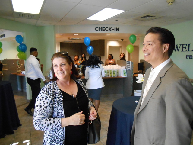 Psychiatrist Marian Orr talks with Well Care founder Marce Casal at the opening of the Well Care Services center at Tropicana Avenue and Boulder Highway.