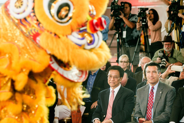 K.T. Lim, chairman and CEO of Genting Group, left, and Gov. Brian Sandoval watch the Resorts World Lion Dancers during the groundbreaking of the $4 billion Resorts World Las Vegas resort property, ...