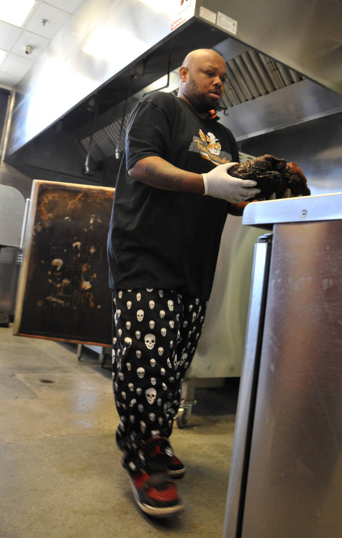 Michael Harris begins preparations for Tennesseasonings' pulled pork each morning about 2 a.m. Photo by Buford Davis / Las Vegas Business Press