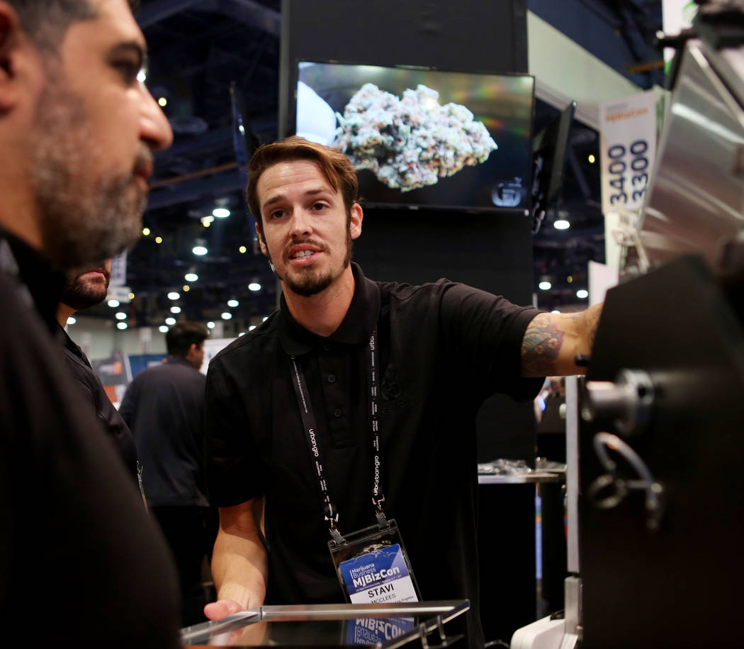 Stave McClees , regional sales manager for GreenBroz Inc., shows a model of their Trichome Extractor during the Marijuana Business Conference at the Las Vegas Convention Center in Las Vegas Nov. 1 ...