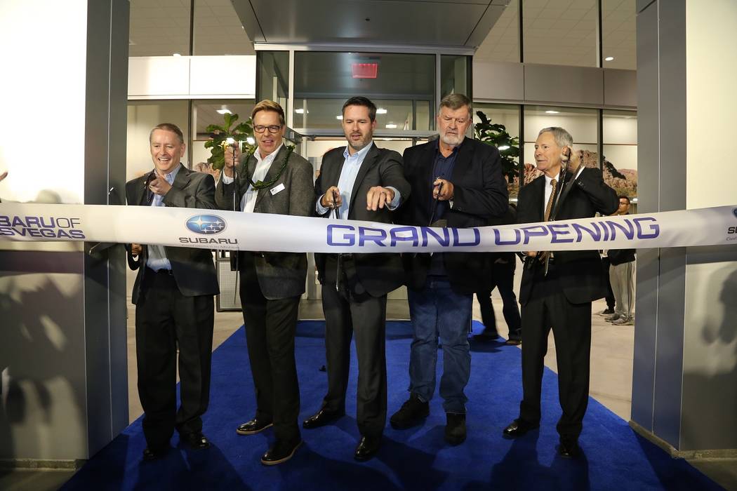 RIBBON CUTTING: The newly built Subaru of Las Vegas dealership recently presented its grand opening at 6455 Roy Horn Way at Rainbow Blvd. and the I-215. Shown cutting the ribbon are, from left, Fi ...