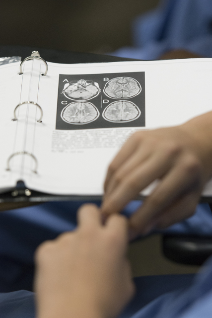 A graphic showing a brain is seen in a student's binder during CAMPMED at UNLV Friday, July 22, 2016. (Jason Ogulnik Business of Medicine)