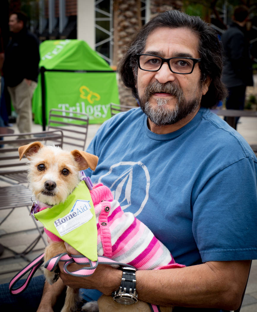 Jesse Saenz and Olivia come out to support HomeAid of Southern Nevada at the "Barkitecture" event March 20. (Tonya Harvey Las Vegas Business Press)