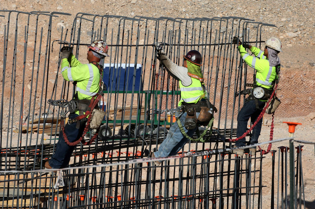 Workers tie rebar at the new Las Vegas ballpark construction site in Summerlin. (Bizuayehu Tesfaye Las Vegas Business Press)