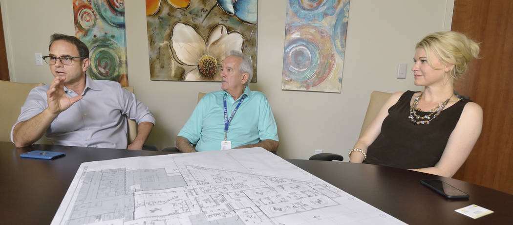Mike Nigro, president of Nigro Construction, left, Mike Latalle, plant operations manager for Mountain’s Edge Hospital, center, and Melissa War, CEO of the hospital, are shown during an intervie ...