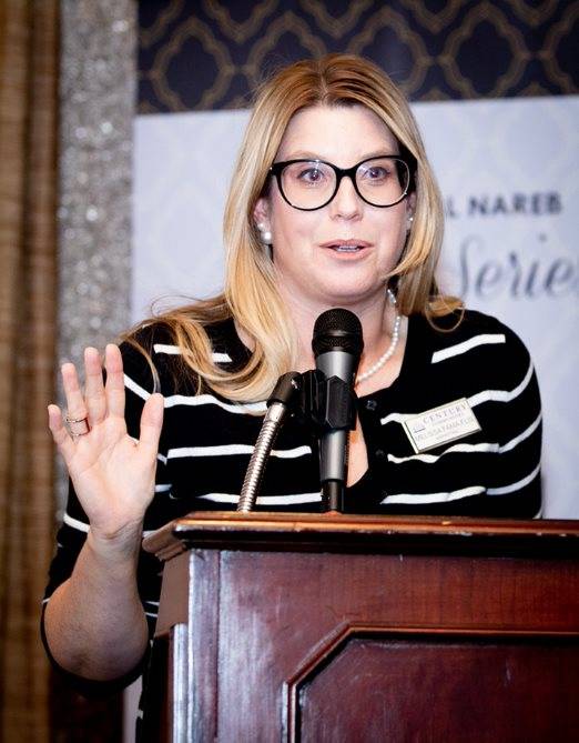Melissa Fama-Flis, marketing director, Nevada, for Century Communities, moderates the NAREB event, the first in a three-part series on luxury real estate. (Tonya Harvey Las Vegas Business Press)