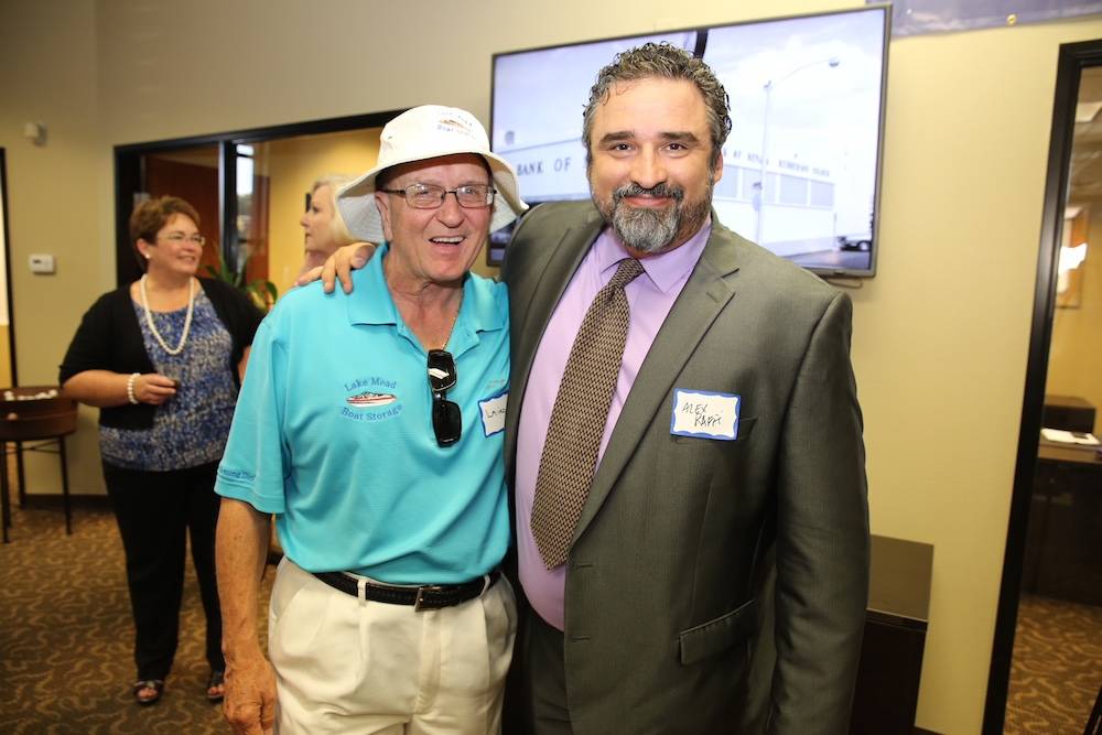 From left, the late Laird Noble Sanders and Alex Raffi, partner and creative director at Imagine Communications, at the grand opening of Valley Bank of Nevada’s Henderson location. Sanders died ...