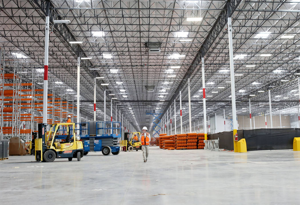 Earlier this year, a crew member oversees construction of the newest Amazon warehouse at Northgate Distribution Center in North Las Vegas. (Elizabeth Brumley/Las Vegas Business Press)