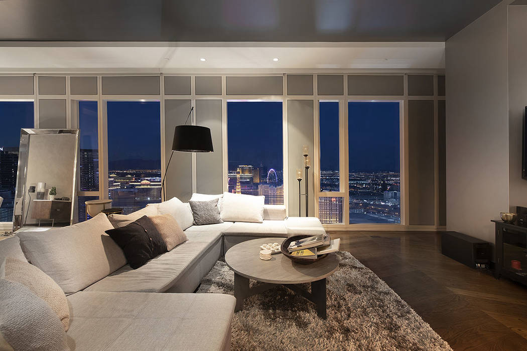 The living room in unit 4504 in Waldorf Astoria, which sold for $4.6 million, has a view of the High Roller Observation Wheel. (Acclaim)