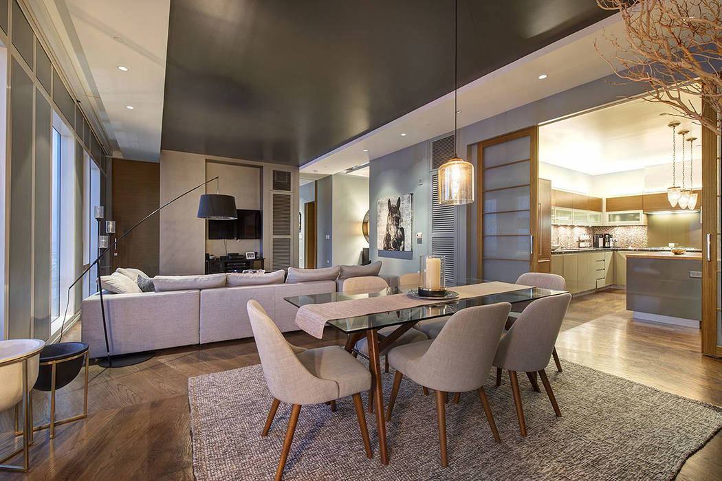 The dining area is next to the kitchen and the living room in unit 4504 in Waldorf Astoria. (Acclaim)